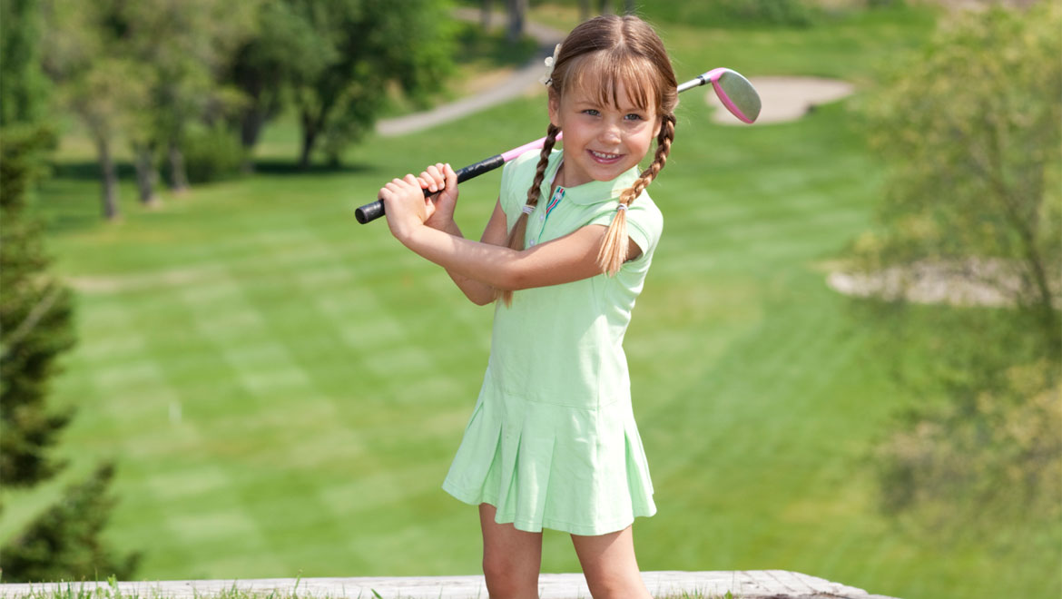 Little girl golfing