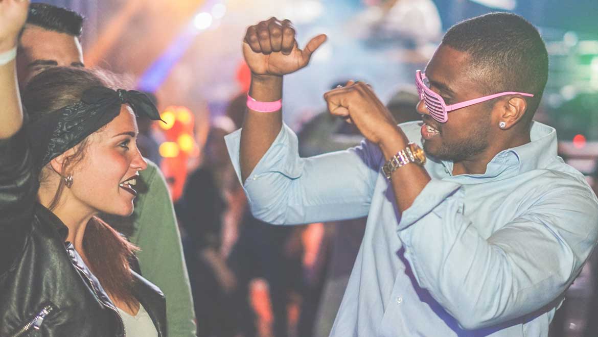 People dancing at a festival