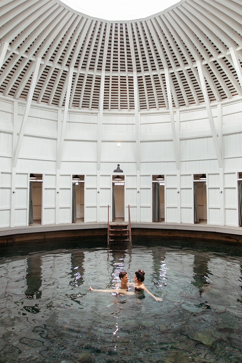 Couple swimming in hot springs