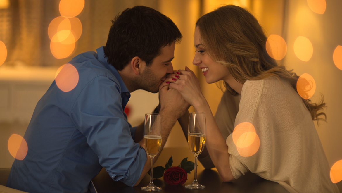 Romantic couple enjoying champagne