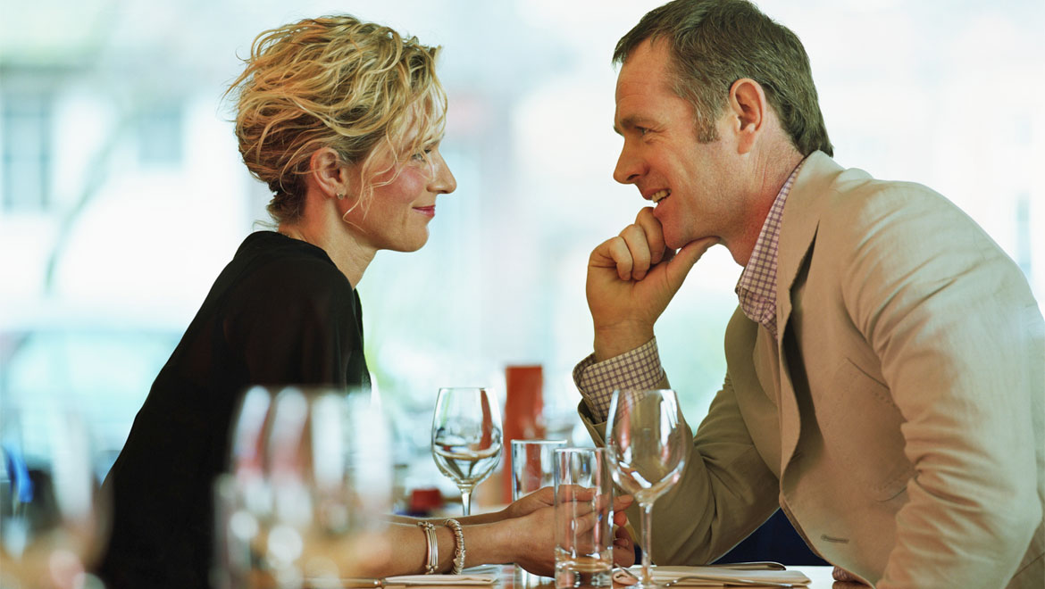 Couple talking in restaurant