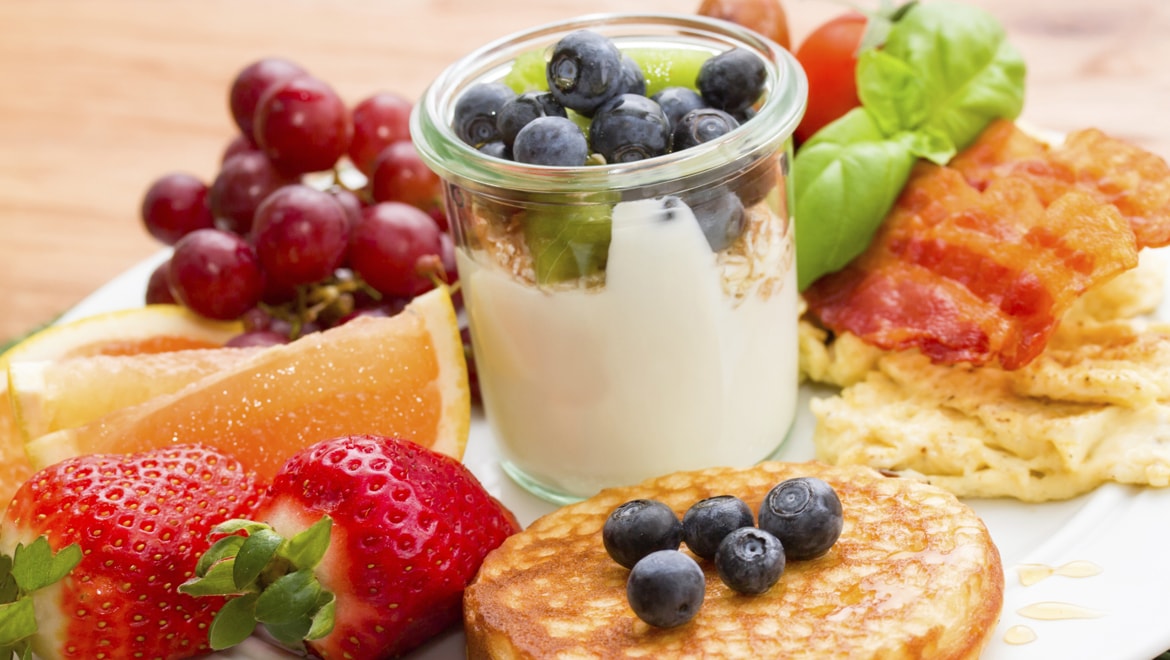 Parfait with side of fresh fruit.