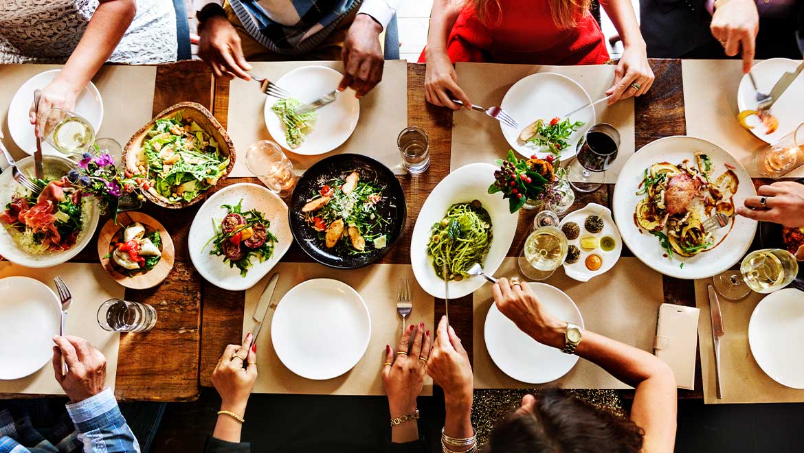 Friends gathered at dinner table