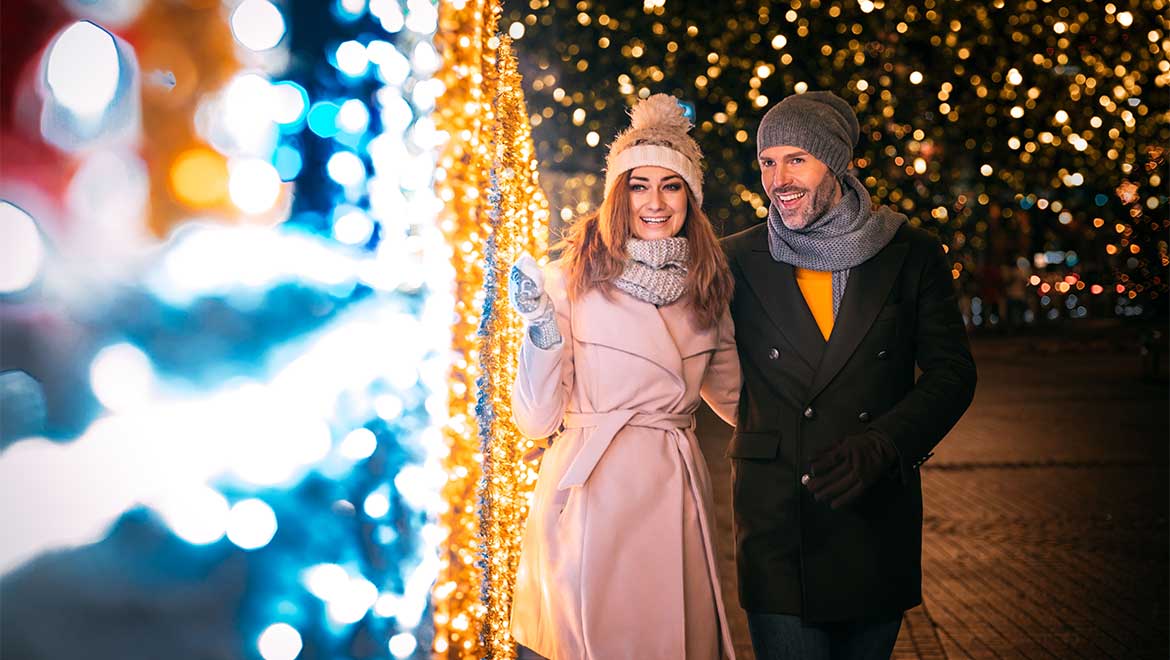 Couple looking at Christmas lights