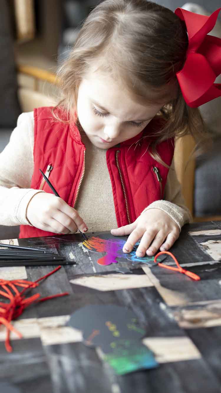 Little girl crafting