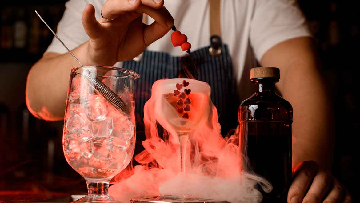 Bartender making Valentine's drinks.