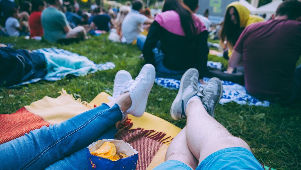 people watching movies on a lawn