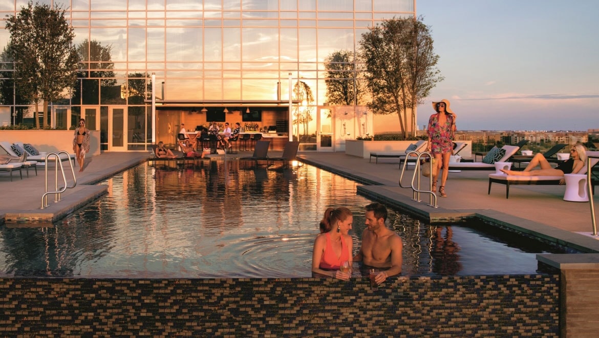 Guests relaxing in pool.