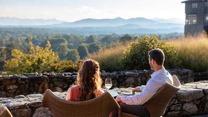 Couple enjoying a glass of wine on the terrace