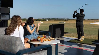 Friends at a golf range