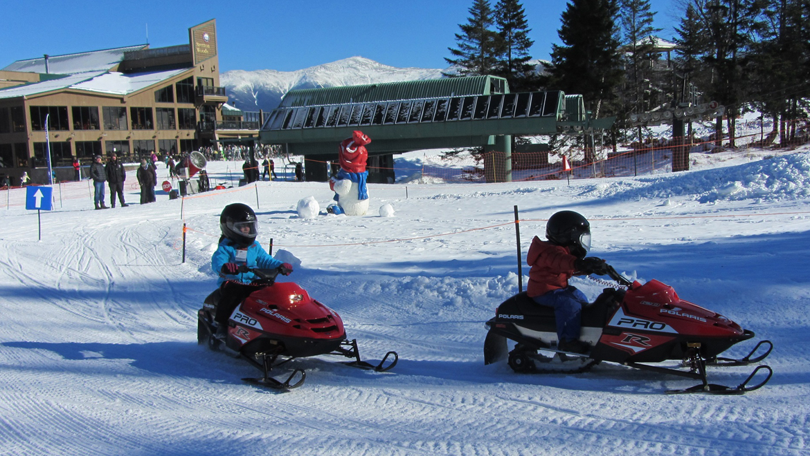 Kids snowmobiling