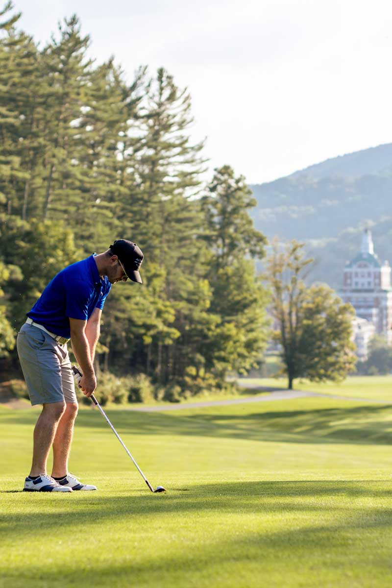 Golfer golfing