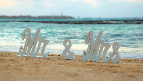 Mr. and Mrs. logo on beach